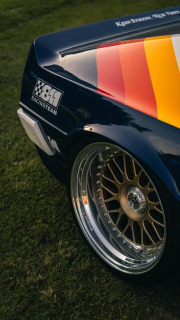 Modified Retro Racing Sports Car Rear View Aesthetic Wallpaper