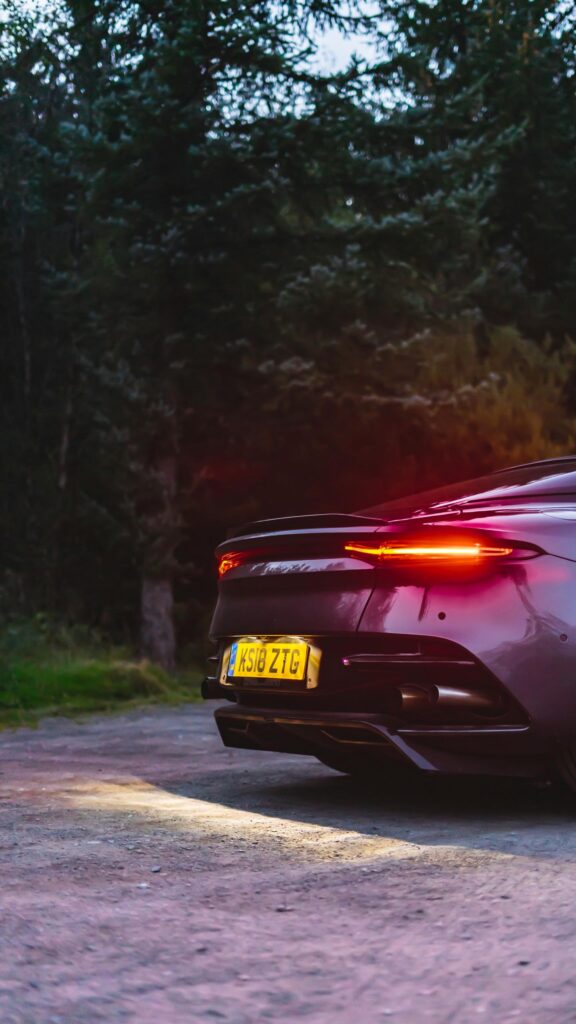 Luxury Aston Martin DBS Superleggera Rear View Phone Wallpaper