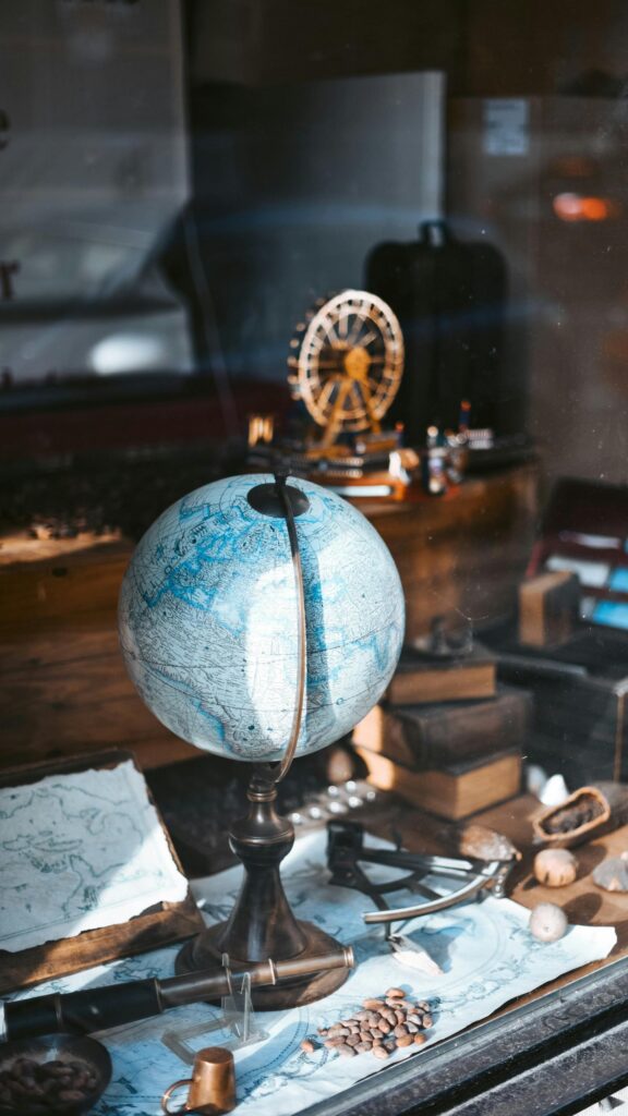 Vintage World Globe and Maritime Explorer Desk Mobile Wallpaper