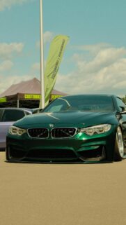 Stanced Dark Green BMW M4 Performance Luxury Car Phone Wallpaper