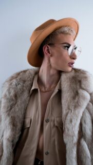 Stylish Fashion Model in Fedora and Fur Coat Mobile Wallpaper