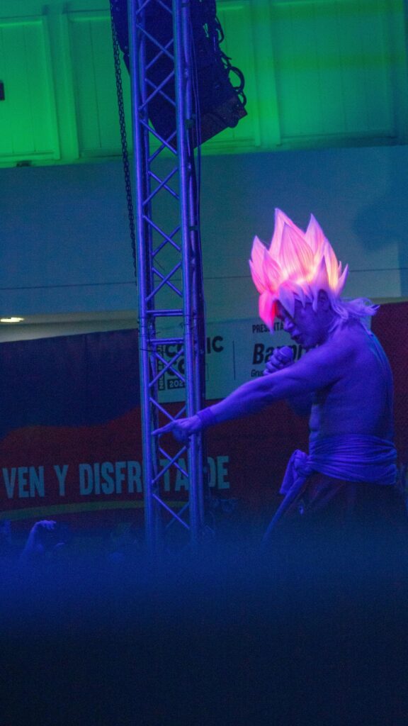 Goku Super Saiyan Glow Live Concert Performance Mobile Wallpaper