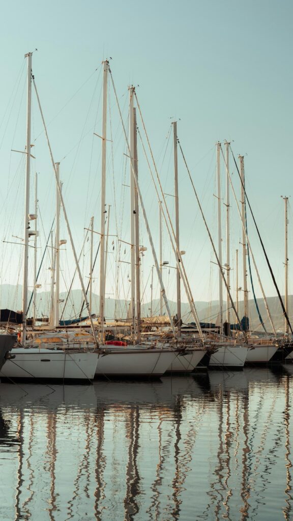 Serene Yacht Marina at Golden Hour Aesthetic Phone Wallpaper