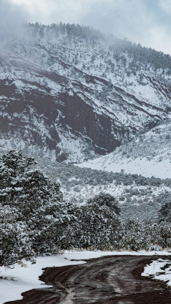 Snowy Mountain Road Winter Landscape Phone Wallpaper