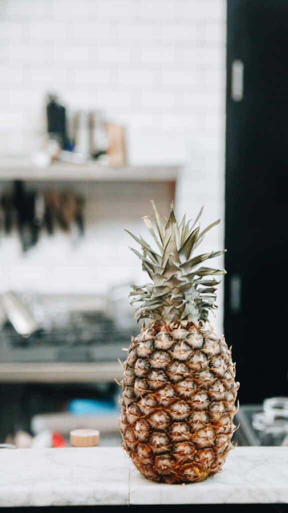 Fresh Pineapple Fruit on Marble Surface Minimalist Phone Wallpaper