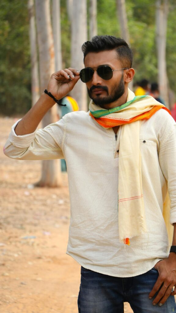 Stylish Indian Man in Sunglasses and Traditional Scarf Portrait Wallpaper