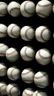 Grid of Clean White Baseballs on Black Background Mobile Wallpaper