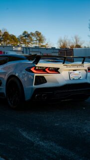 Sleek White Chevrolet Corvette C8 Sports Car Phone Wallpaper