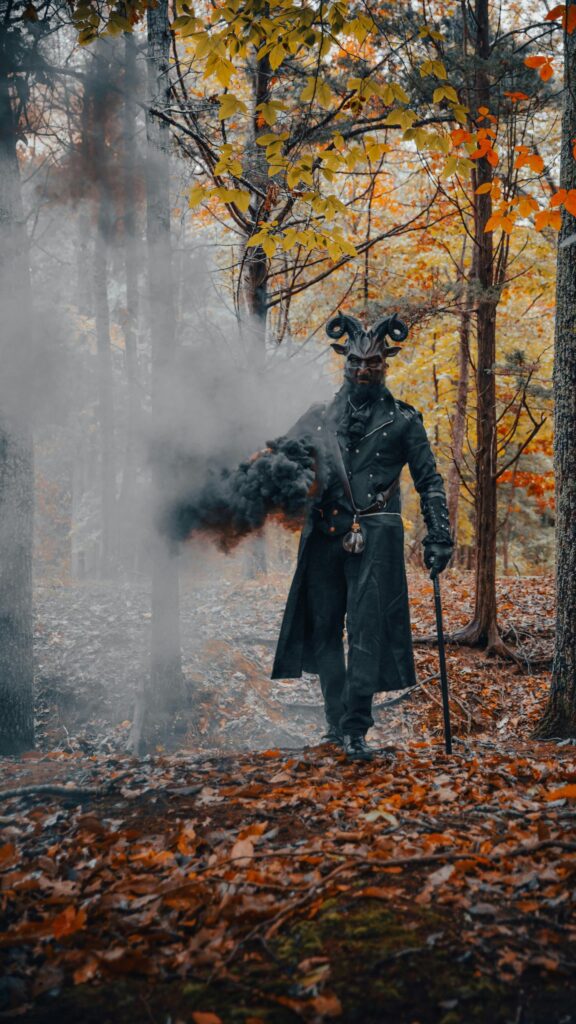 Dark Fantasy Goat Demon in Autumn Forest Phone Wallpaper
