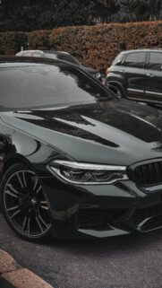 Dark BMW M5 Sport Sedan Front View Luxury Car Mobile Wallpaper