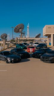 Exotic Sports Cars Collection on Rooftop Parking Wallpaper