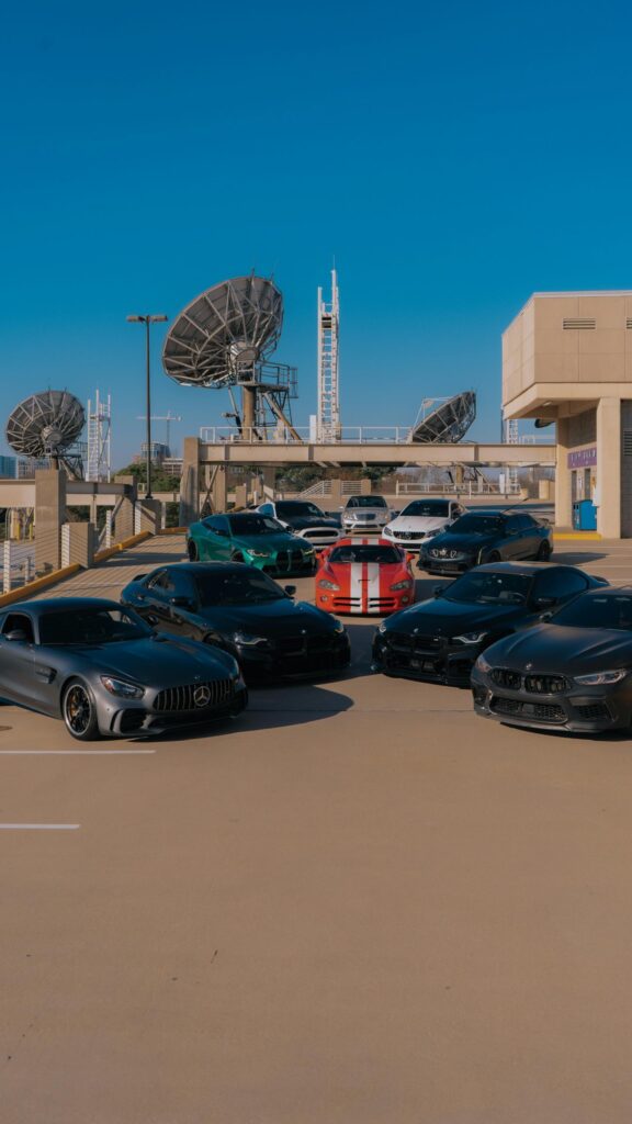 Exotic Sports Cars Collection on Rooftop Parking Wallpaper