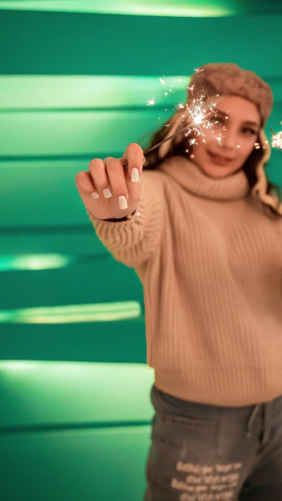 Girl Holding Sparkler with Green Neon Aesthetic Phone Wallpaper