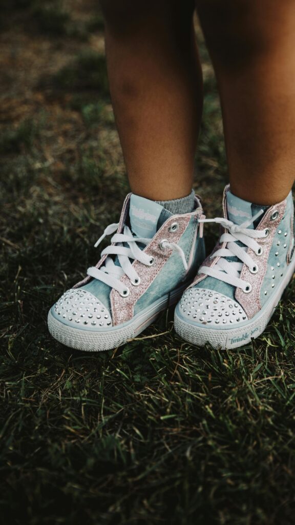Adorable Toddler Sneakers with Sparkly Rhinestone Details Wallpaper