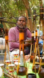 Artisan Craftsman with Traditional Handmade Instruments Wallpaper
