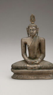 Serene Bronze Buddha Statue for Mindfulness and Zen Meditation Wallpaper