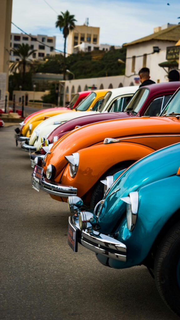Colorful Classic Volkswagen Beetle Lineup Mobile Wallpaper