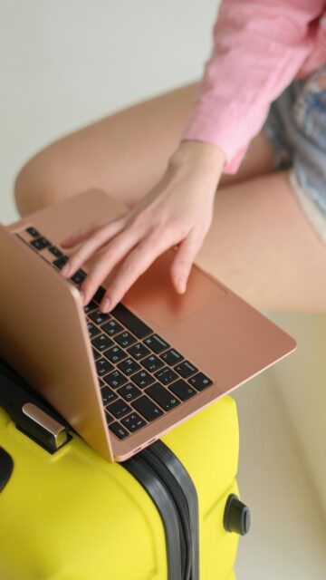 Aesthetic Rose Gold Laptop and Travel Suitcase Mobile Wallpaper