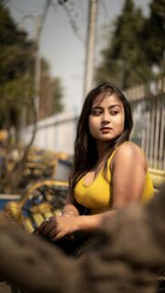 Beautiful Young Woman in Yellow Tank Top Outdoor Portrait Wallpaper