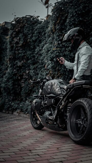Stylish Biker with Custom BMW Motorcycle Mobile Wallpaper