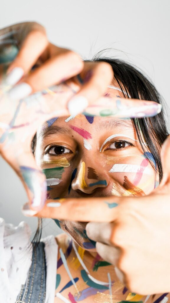 Colorful Painted Face Woman Framing View Portrait Mobile Wallpaper