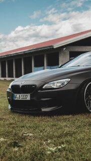 Matte Black BMW M6 Sport Car Front View Mobile Phone Wallpaper