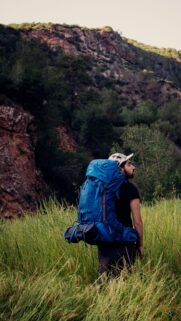 Adventurous Hiker in Mountain Nature Wilderness Mobile Wallpaper