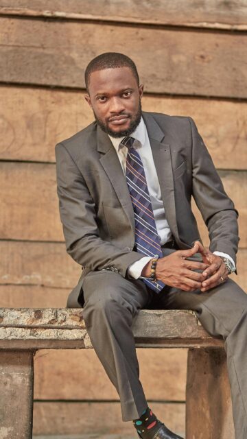 Dapper Gentleman in Suit Professional Portrait Mobile Wallpaper