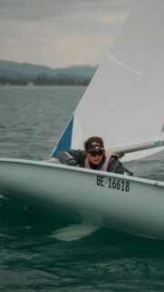 Sailor in Action on Open Water High Resolution Mobile Wallpaper
