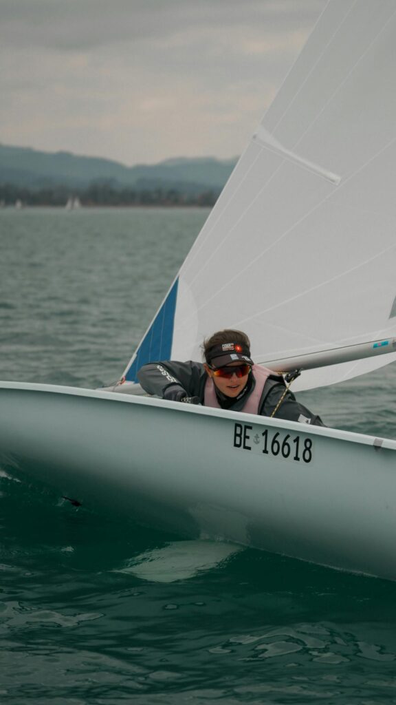 Sailor in Action on Open Water High Resolution Mobile Wallpaper
