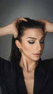 Stunning Fashion Beauty Portrait with Glamorous Green Eyeshadow Wallpaper