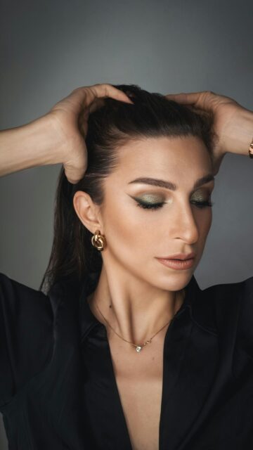 Stunning Fashion Beauty Portrait with Glamorous Green Eyeshadow Wallpaper