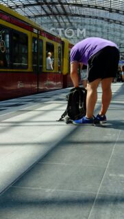 Person at Berlin Train Station Travel Aesthetic Mobile Wallpaper