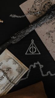 Magical Wizard Wand and Deathly Hallows Relics Phone Wallpaper