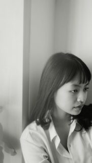 Elegant Asian Girl Side Profile Minimalist Aesthetic Wallpaper
