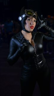 Stunning Catwoman Cosplay Portrait in Sleek Leather Suit Wallpaper