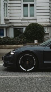 Sleek Dark Gray Porsche Taycan Sport Car Phone Wallpaper