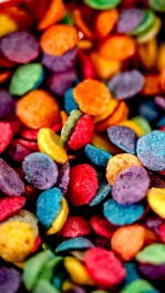 Vibrant Multi-Colored Breakfast Cereal Macro Texture Mobile Wallpaper