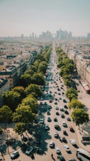 Stunning Aerial View of Paris Avenue with La Défense Skyline Wallpaper