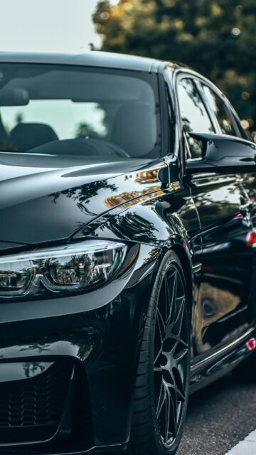 Stunning Black BMW Sports Car Front View Mobile Wallpaper
