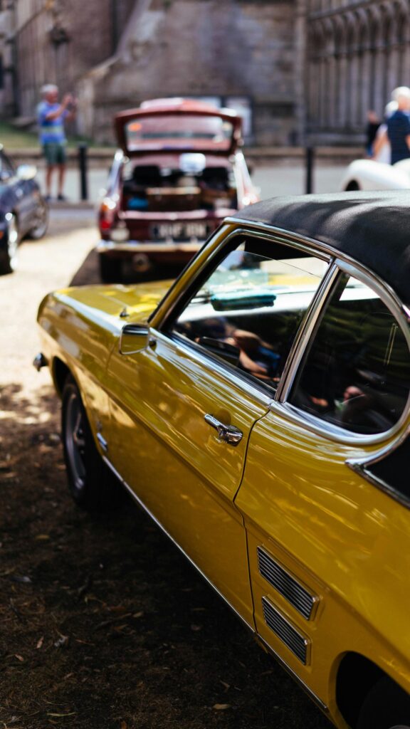 Vintage Yellow Classic Car Side View Aesthetic Mobile Wallpaper