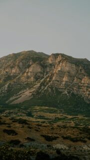 Majestic Rugged Mountain Peaks at Golden Hour Phone Wallpaper