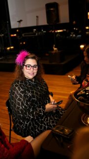 Woman With Pink Feather Hairpiece and Trendy Glasses Portrait Wallpaper
