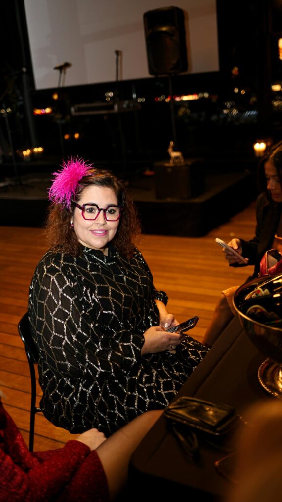 Woman With Pink Feather Hairpiece and Trendy Glasses Portrait Wallpaper