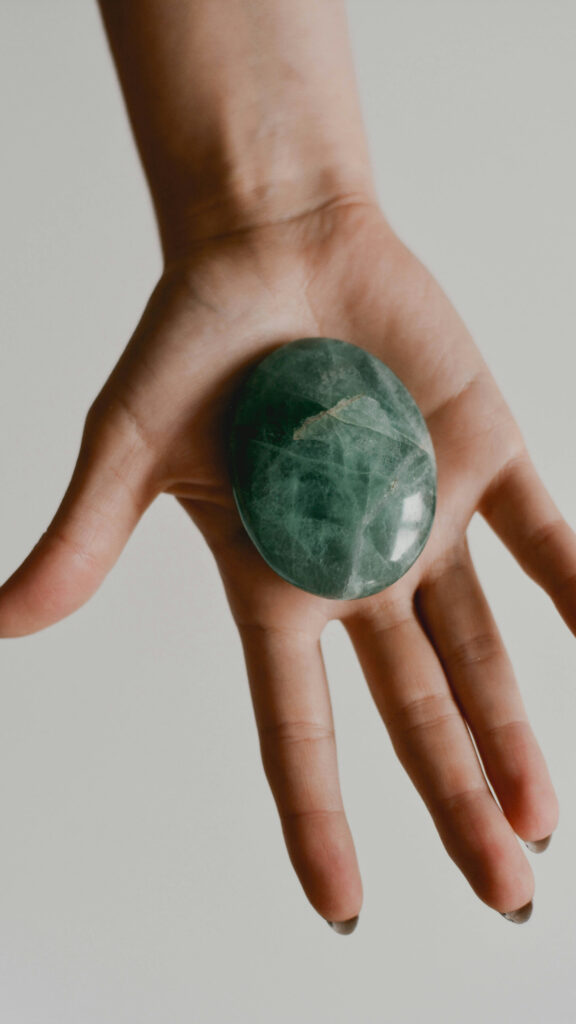 Green Fluorite Crystal Palm Stone for Focus and Mental Clarity Wallpaper