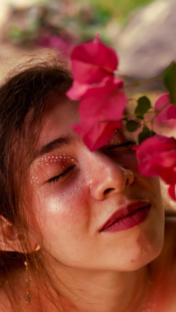 Close-up Portrait of a Woman with Pink Flowers Floral Aesthetic Wallpaper