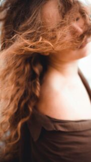 Dreamy Windblown Redhead Woman Aesthetic Phone Wallpaper