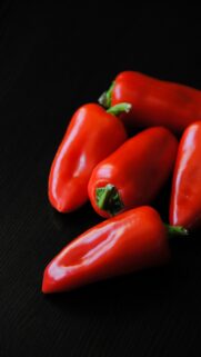 Vibrant Red Bell Peppers Close-Up Still Life Phone Wallpaper