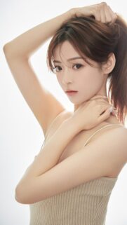 Stunning Portrait of an Asian Beauty with Ponytail Aesthetic Wallpaper