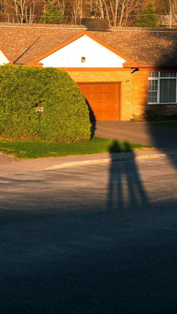 Golden Hour Suburban Home with Long Shadows Mobile Wallpaper